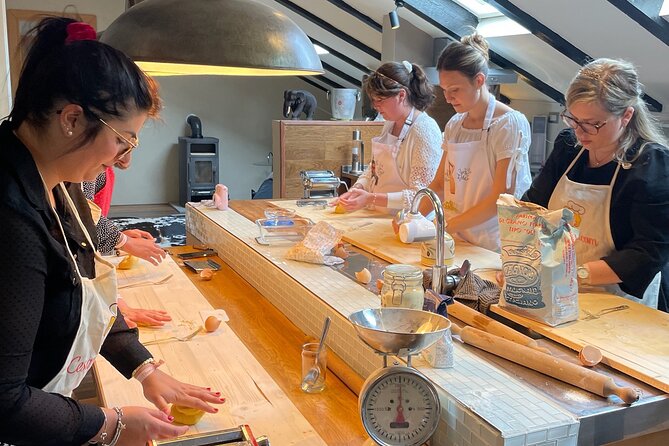 2-Hour Guided Family Pasta or Pizza Cooking Class in Acqui Terme - The portico setting and the rhythm of the day