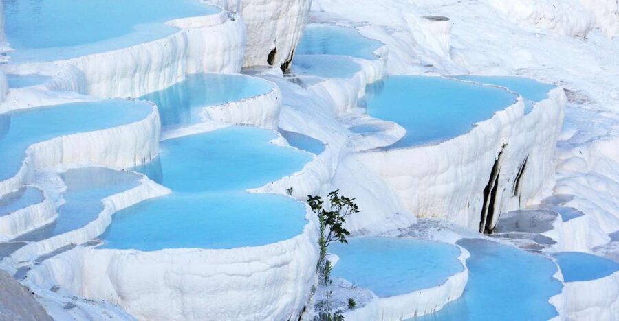 Antalya: Full-Day Pamukkale Tour - Walking through Hierapolis before the pools