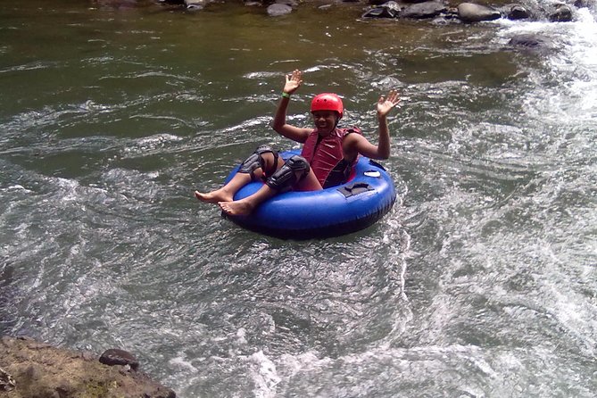 Arenal Volcano Combination Tour: Zipline, Tubing and Hot Springs - Tubing the Arenal River rapids