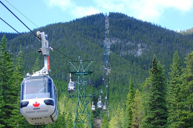Banff Gondola Hot Springs Bow Falls and Three Lakes tour - Soaking at Banff Upper Hot Springs