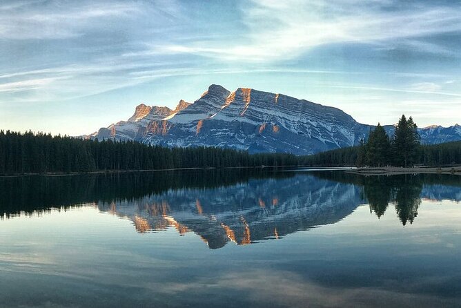Banff Gondola Hot Springs Bow Falls and Three Lakes tour - Lake Minnewanka brings the widest open views