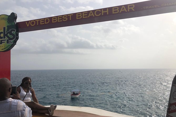 Blue Hole Mineral Springs, Rick's Café, and Shopping Combo Tour - A private way to see three sides of Negril