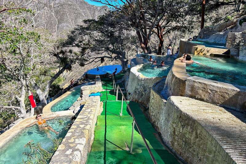 From Mexico City: Tolantongo Hot Springs Day Trip with Guide - Inside the caves, where warm water changes the mood