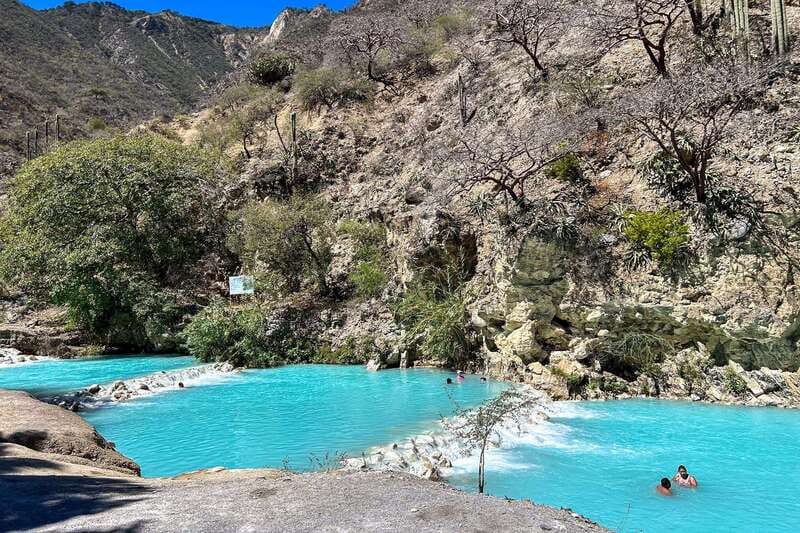From Mexico City: Tolantongo Hot Springs Day Trip with Guide - What the $132 price really covers
