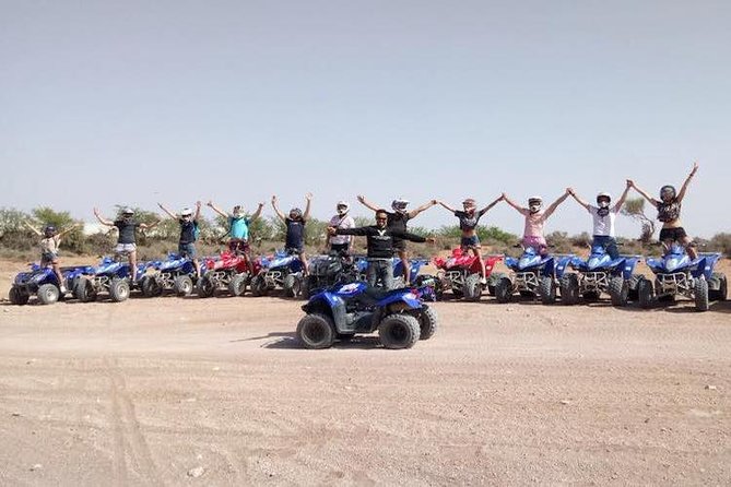 Hot spring and Atlas mountains quad biking tour - Getting ready with a helmet, goggles, and quad