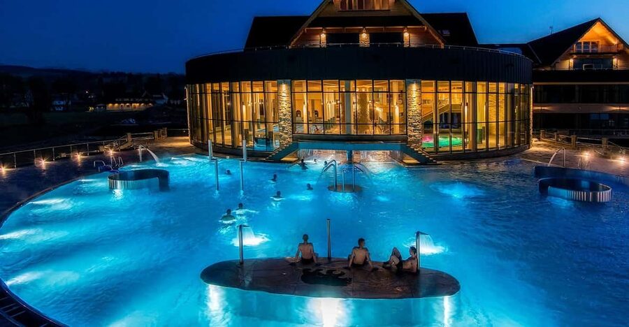 Krakow: Thermal Baths Amazing Experience - Outdoor pools, warm water, and the sunset hour