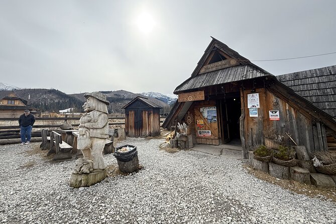 Krakow to Zakopane and Thermal Baths Shared Day Tour - Grilling oscypek beside the fire