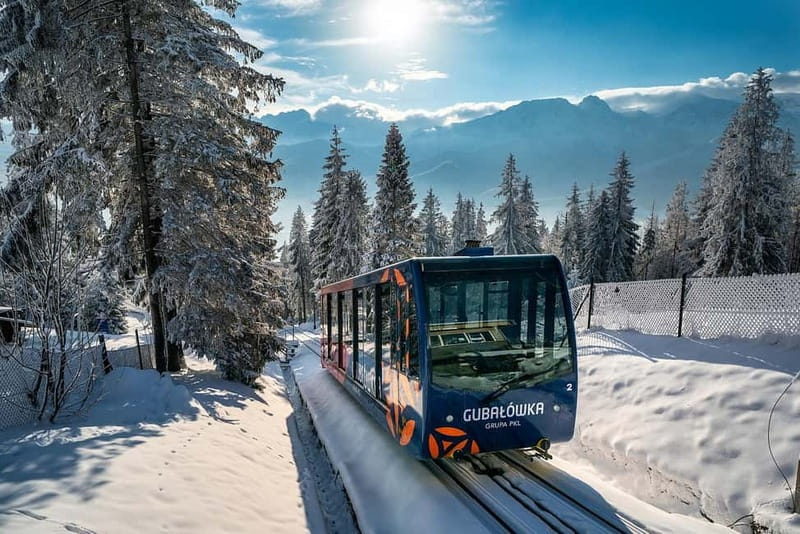 Krakow: Zakopane, Snowmobiles, Cable Car & Hot Springs Tour - Key points at a glance
