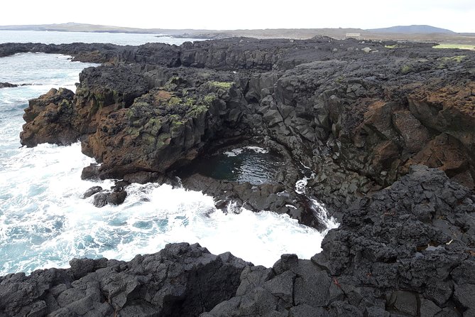 Lava, Craters and Hot Springs Private Tour - B-24 Memorial Board: a quiet beginning