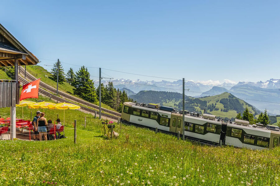 Lucerne: Boat Trip, Mount Rigi Train, & Mineral Baths Ticket - Boarding the Lake Lucerne boat at Landungssteg 1