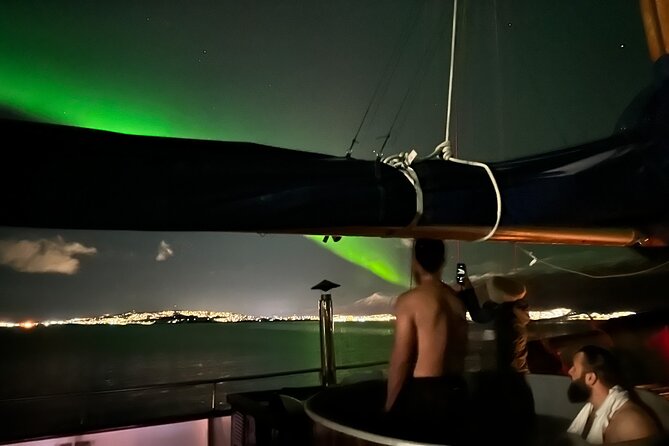 Luxury Northern Lights Yacht Cruise with Hot Tub from Tromsø - Searching the sky from Tromsø’s waters