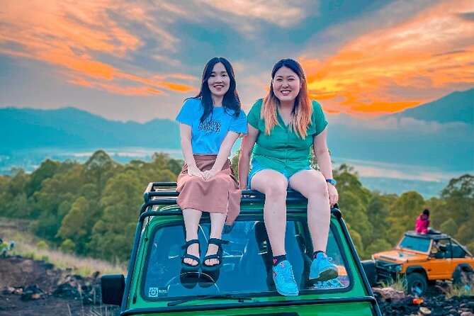 Mount Batur Jeep Sunrise and Natural Hot Spring Tour - Sunrise, breakfast, and the black lava fields
