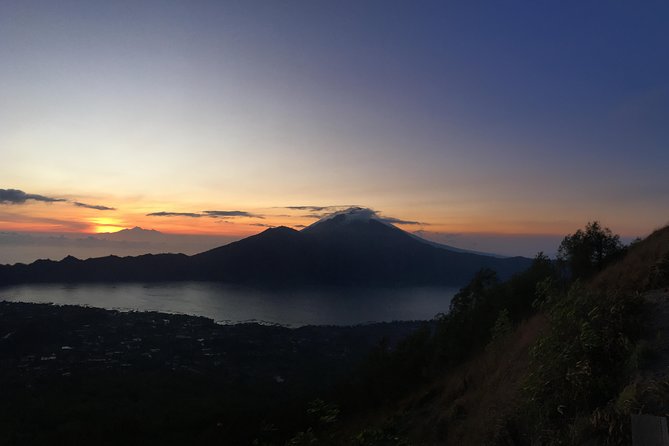 Mount Batur Sunrise Trekking & Hot Spring Tour - Waiting for sunrise at the summit