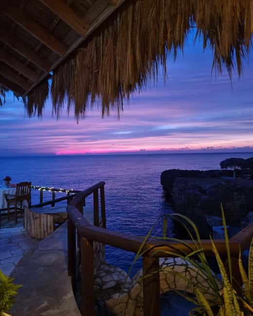 Negril Marijuana Farm and Mineral Spring Tour - Sunset, reggae, and cliff jumping at Rick’s Cafe