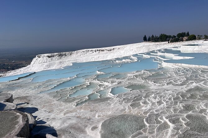 Pamukkale Day Tour from Kusadasi with Lunch - Walking through ancient Hierapolis