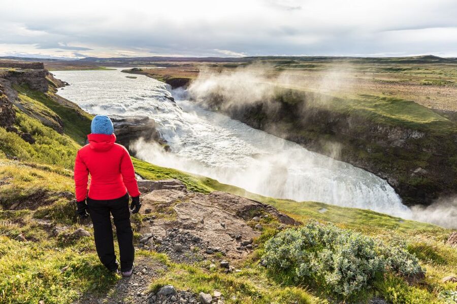 Reykjavik: Golden Circle Day Trip with Blue Lagoon Transfer - Kerid Crater: red rock around an aquamarine lake