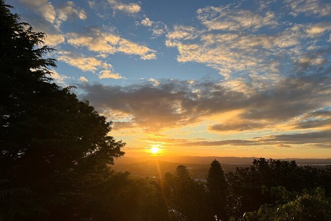 Romantic Auckland Sunset tour with Winery & Thermal pool - A twilight plan that mixes coast, food, and warm water