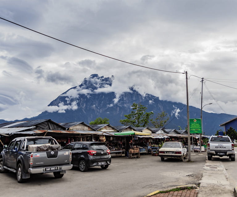 Sabah: Kinabalu Park, Hot Springs, and Cow Farm Day Tour - The road from Kota Kinabalu to Nabalu Market