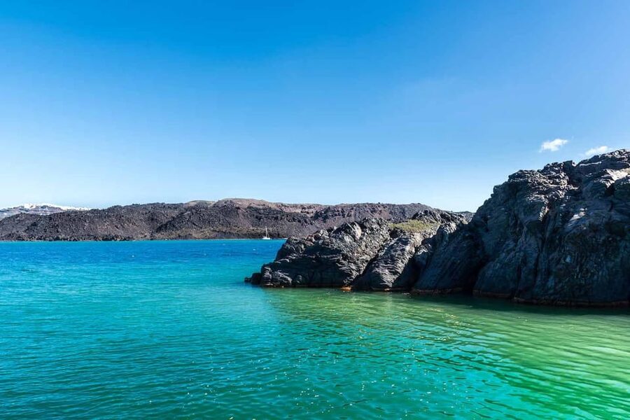 Santorini Port: 3 Hour Cruise to Volcano and Hot Springs - Walking across the active volcano on Nea Kameni