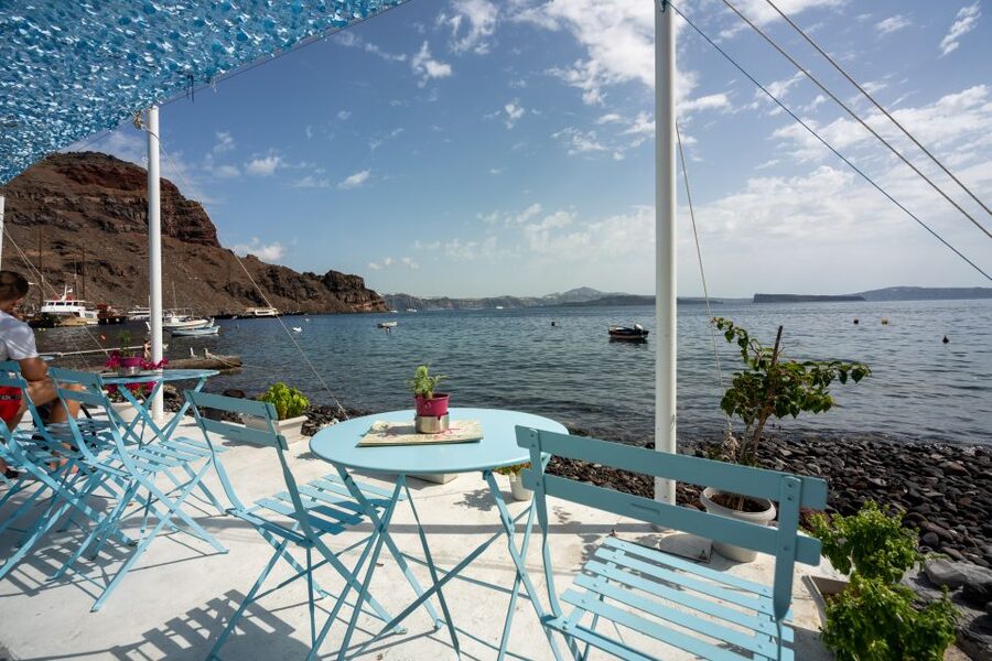 Santorini: Volcanic Islands Cruise with Hot Springs Visit - The wooden boat and the caldera crossing