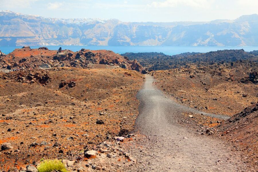 Santorini: Volcano and Hot Springs Sunset Dinner Cruise - Thirassia and the open-water views