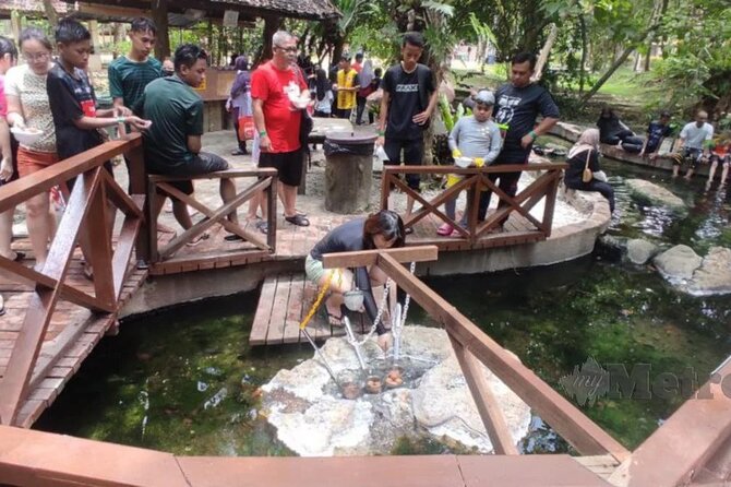Sungkai Hot Springs & Nature Park Tour from Kuala Lumpur - A short walk through tropical gardens
