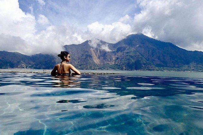 Ubud Volcano Lake and Natural Hot Spring Tour - Tirta Empul shows Bali’s living temple customs