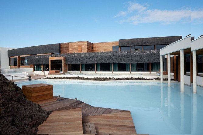 Unique bathing in an Icelandic hot springs at the Blue Lagoon - The Blue Lagoon setting: warm water and black lava